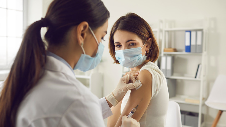 Woman getting a vaccine