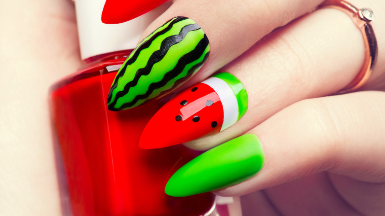 Watermelon painted stiletto fingernails