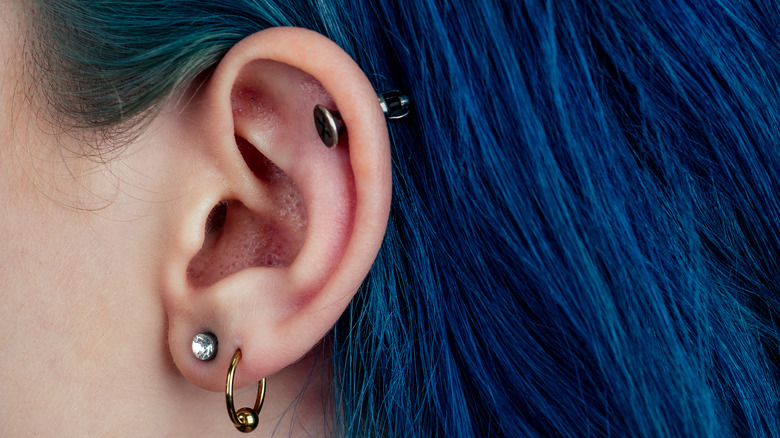 woman with double ear piercing