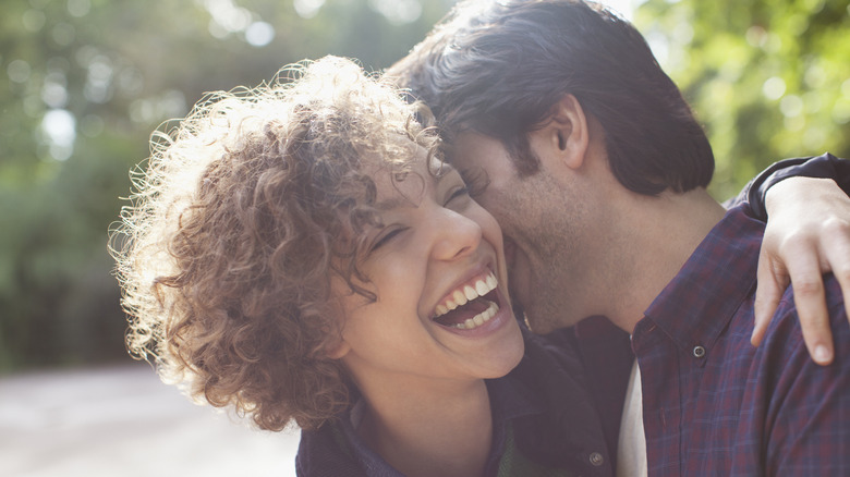 Woman laughing at date