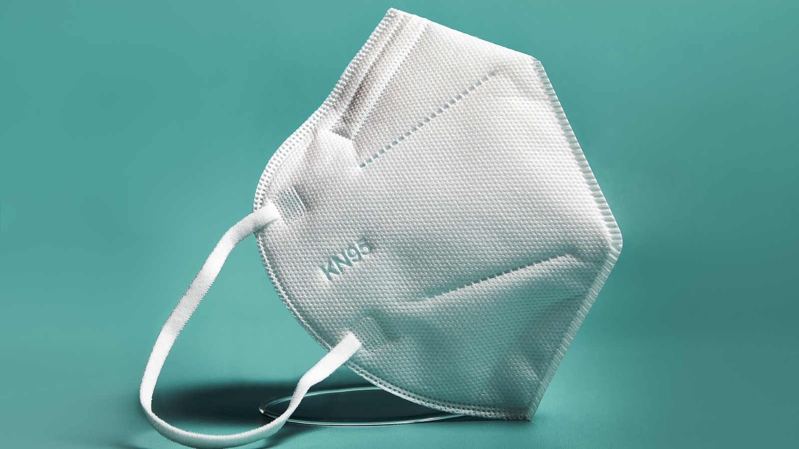 Here's When You Should Switch Out Your KN95 Mask, According To Experts