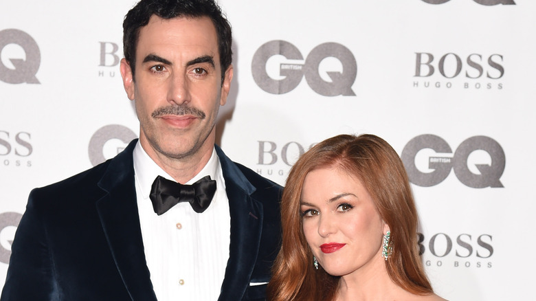 Actors Sacha Baron Cohen and Isla Fisher in the red carpet