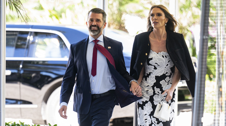 Donald Trump Jr. holding hands with Bettina Anderson