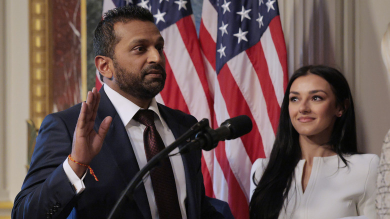 Kash Patel standing next to Alexis Wilkins