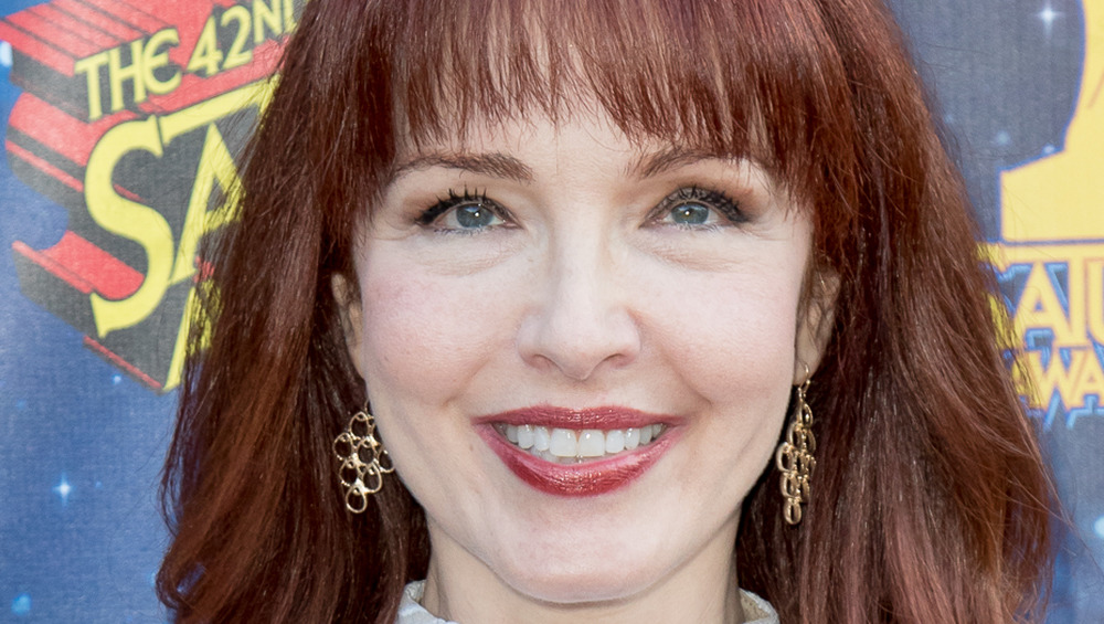 Amy Yasbeck smiling