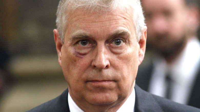 Prince Andrew looks pensive