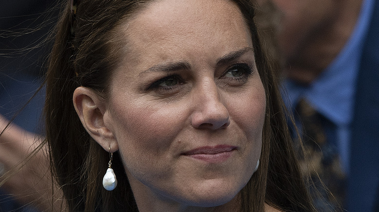 Kate Middleton waves during Wimbledon match