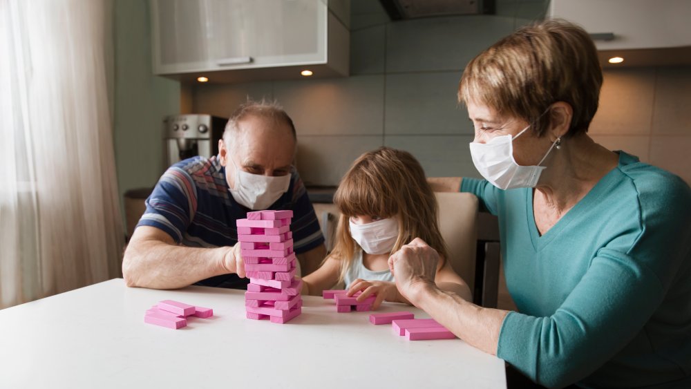 Grandparents with their granddaughter