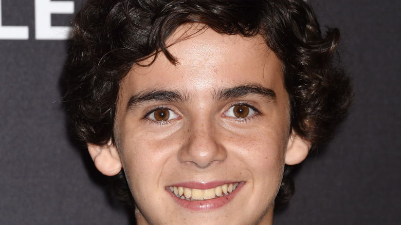 Jack Dylan Grazer smiling on red carpet 