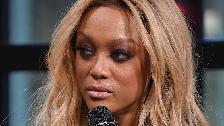 Tyra Banks with microphone