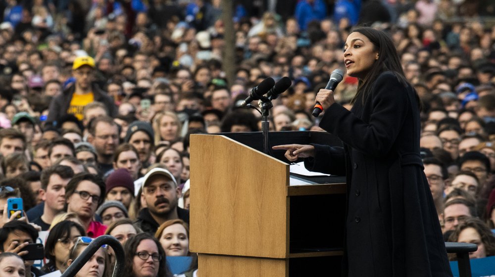 Alexandria Ocasio-Cortez speaking at a campaign rally