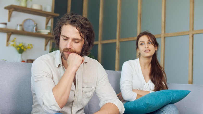 unhappy man and woman in disagreement