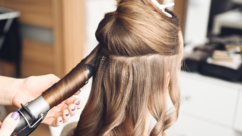 Woman getting her hair done