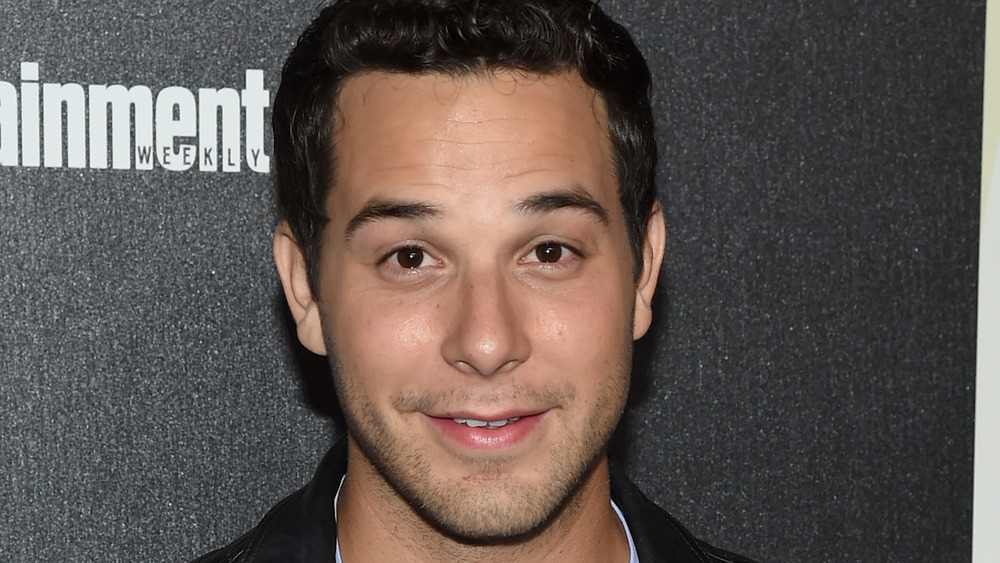 Skylar Astin smiling