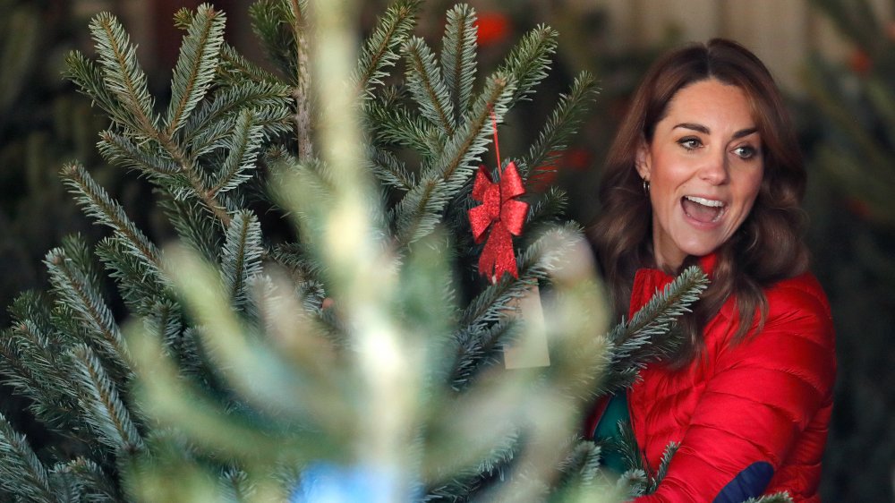 Kate Middleton with a Christmas tree