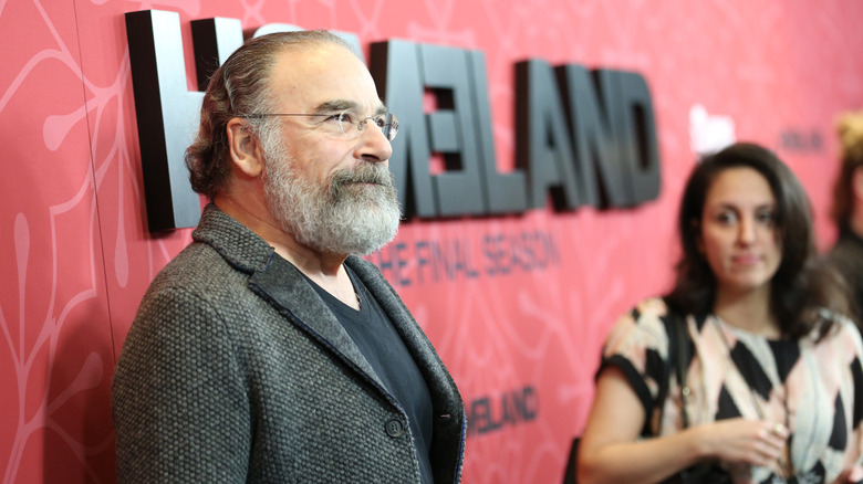 Side profile close up of Mandy Patinkin