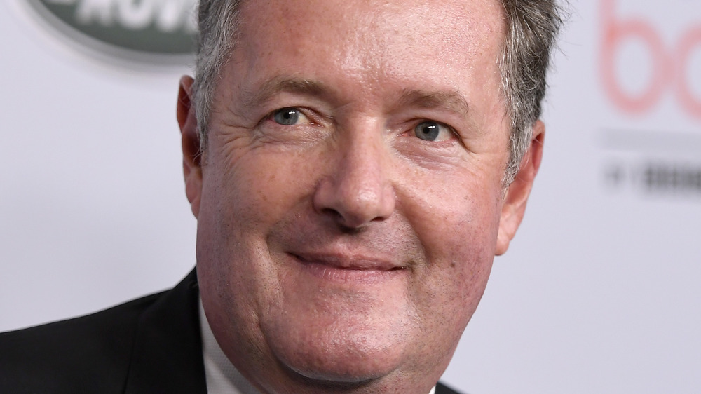 Piers Morgan grinning