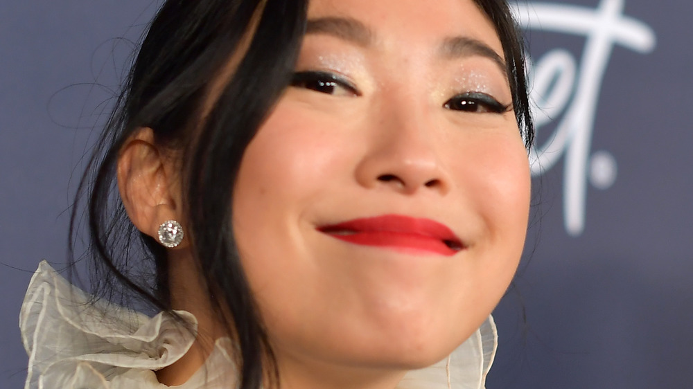 Awkwafina smiling at Golden Globes