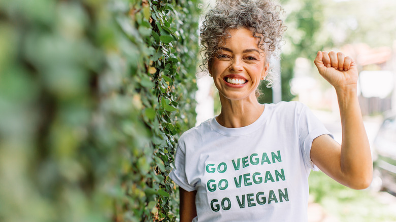 Woman wearing Go Vegan shirt