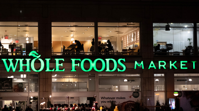 A lit up Whole Foods sign