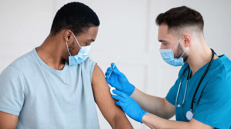 Man getting COVID vaccine