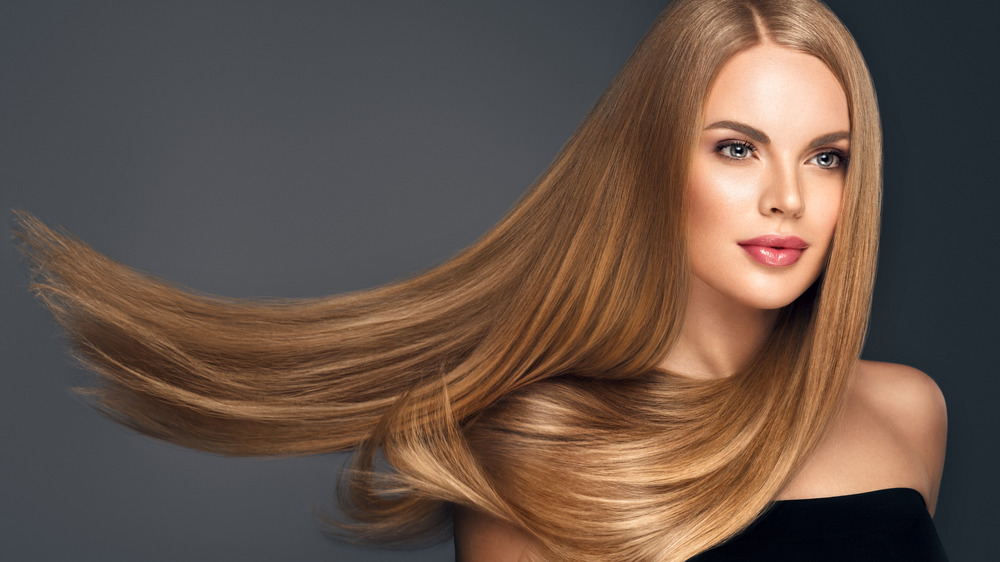 Woman with long hair flowing