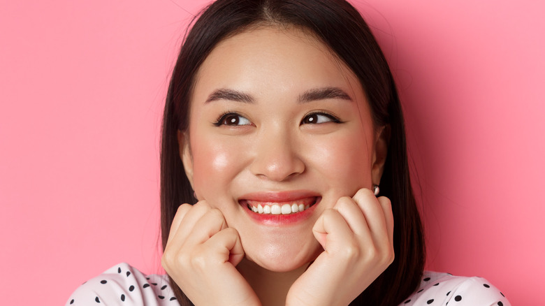 Woman blush cheeks 