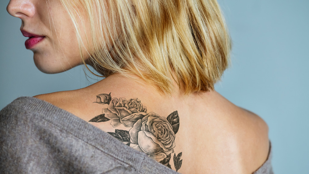 Woman with a back tattoo