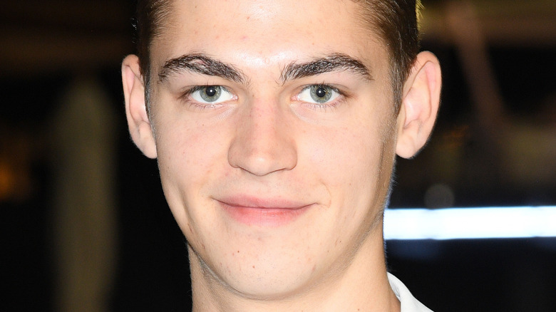 Hero Fiennes Tiffin smiling