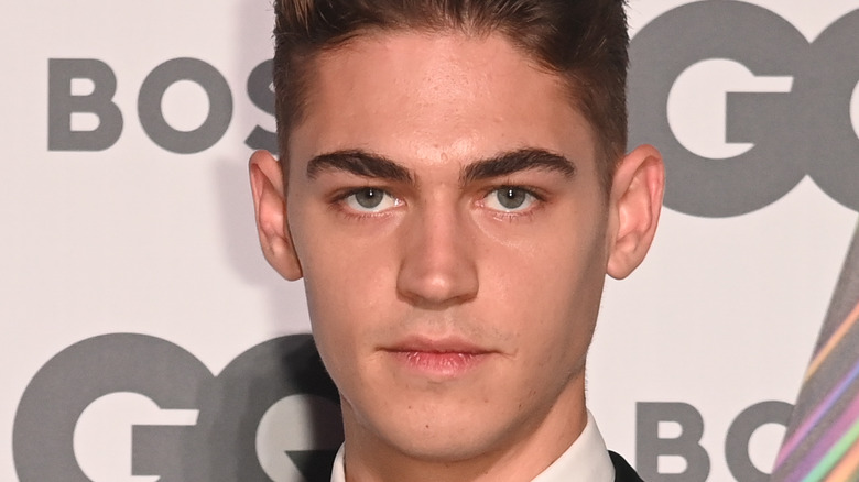 Hero Fiennes Tiffin posing 