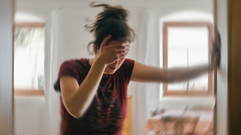 woman suffering from a dizzy spell 