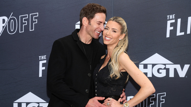 Tarek and Heather Rae El Moussa smiling in 2025