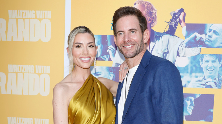 Tarek and Heather Rae El Moussa smiling in 2025