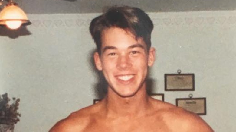 Young David Bromstad smiling
