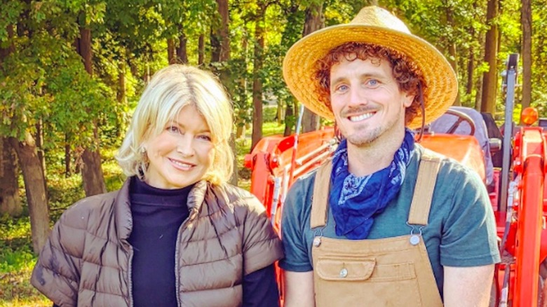 Martha Stewart in her garden with Ryan McCallister
