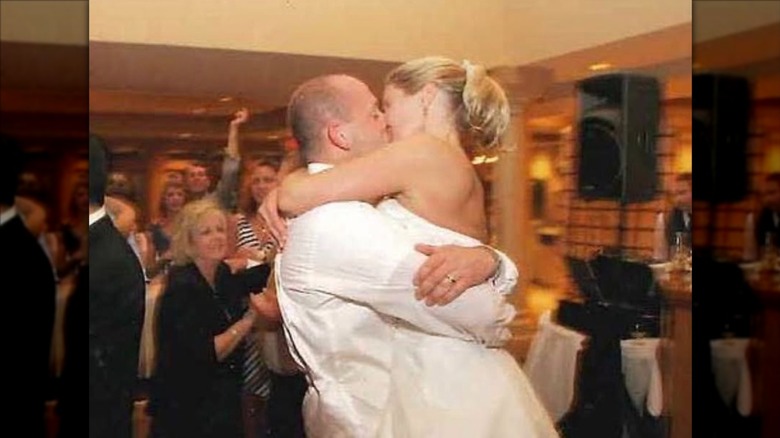 Jenny and Dave Marrs kissing on their wedding day