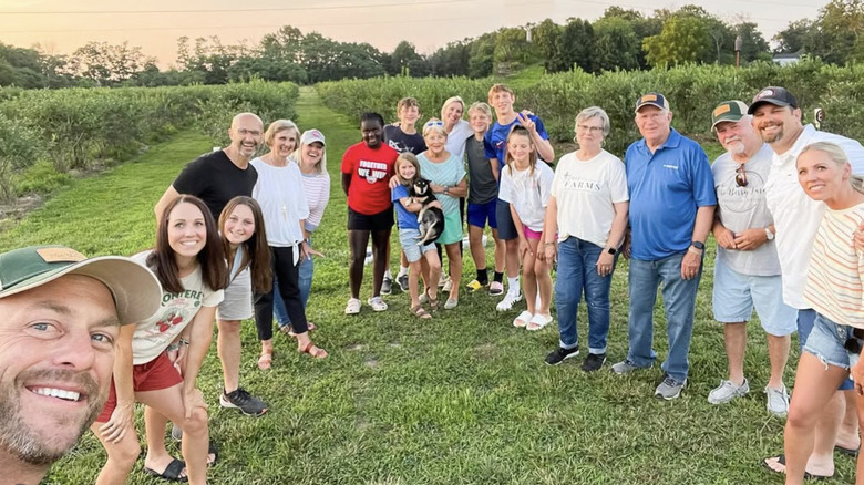 Jenny and Dave Marrs with family and friends at The Berry Farm