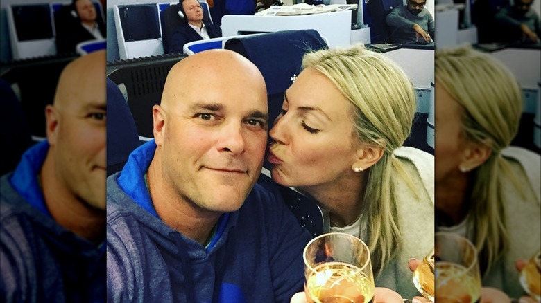 Sarah kissing Bryan's cheek in a selfie