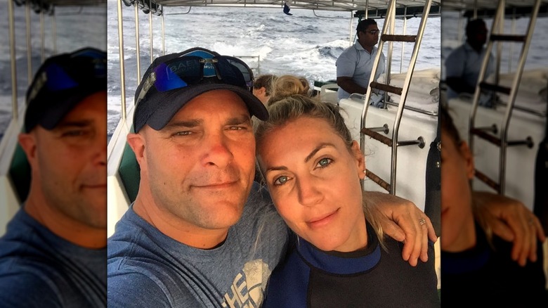 Bryan and Sarah Baeumler smiling on a boat