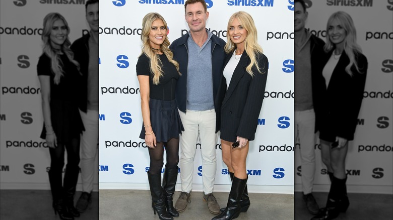 Christina Haack posing with two other people at Pandora Music event