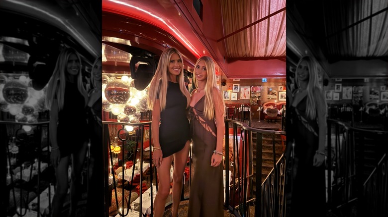 Christina Haack posing with daughter in atmospheric restaurant