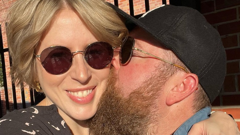 Ben kisses Erin on the cheek