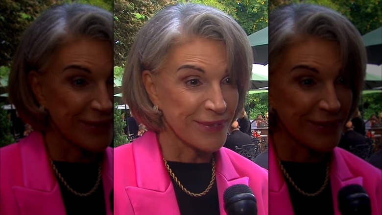 Hilary Farr smiling with microphone