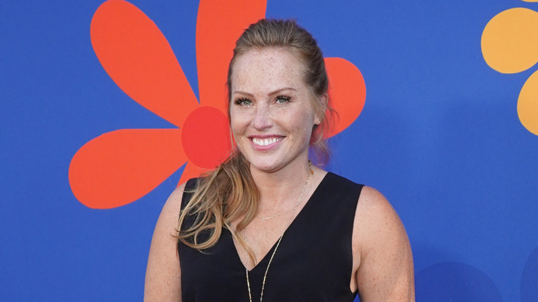 Mina Starsiak Hawk posing at an HGTV event in 2019
