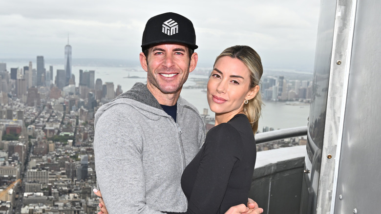Tarek and Heather Rae El Moussa on top of the Empire State Building in 2024