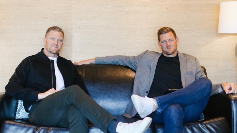 David and Jason Benham pose while sitting on a couch for an Instagram photo