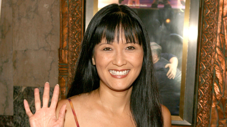 Suzanne Whang waving 
