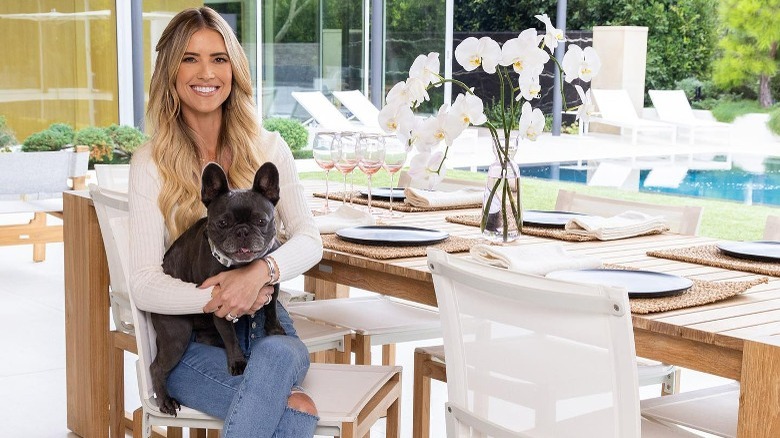 Christina Haack holding her dog