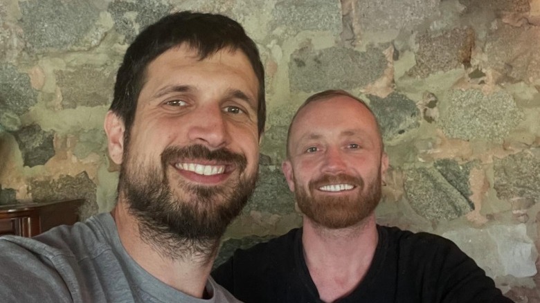 Evan Thomas and Keith Bynum pose together for an Instagram selfie (2025)