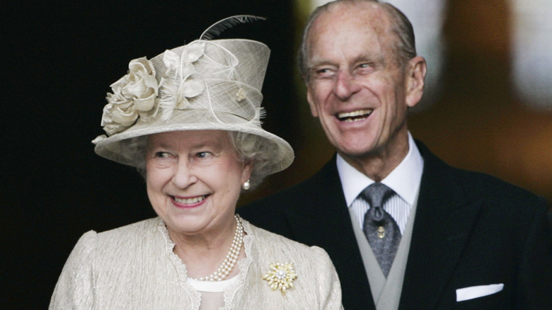 Queen Elizabeth II and Prince Philip sharing a laugh